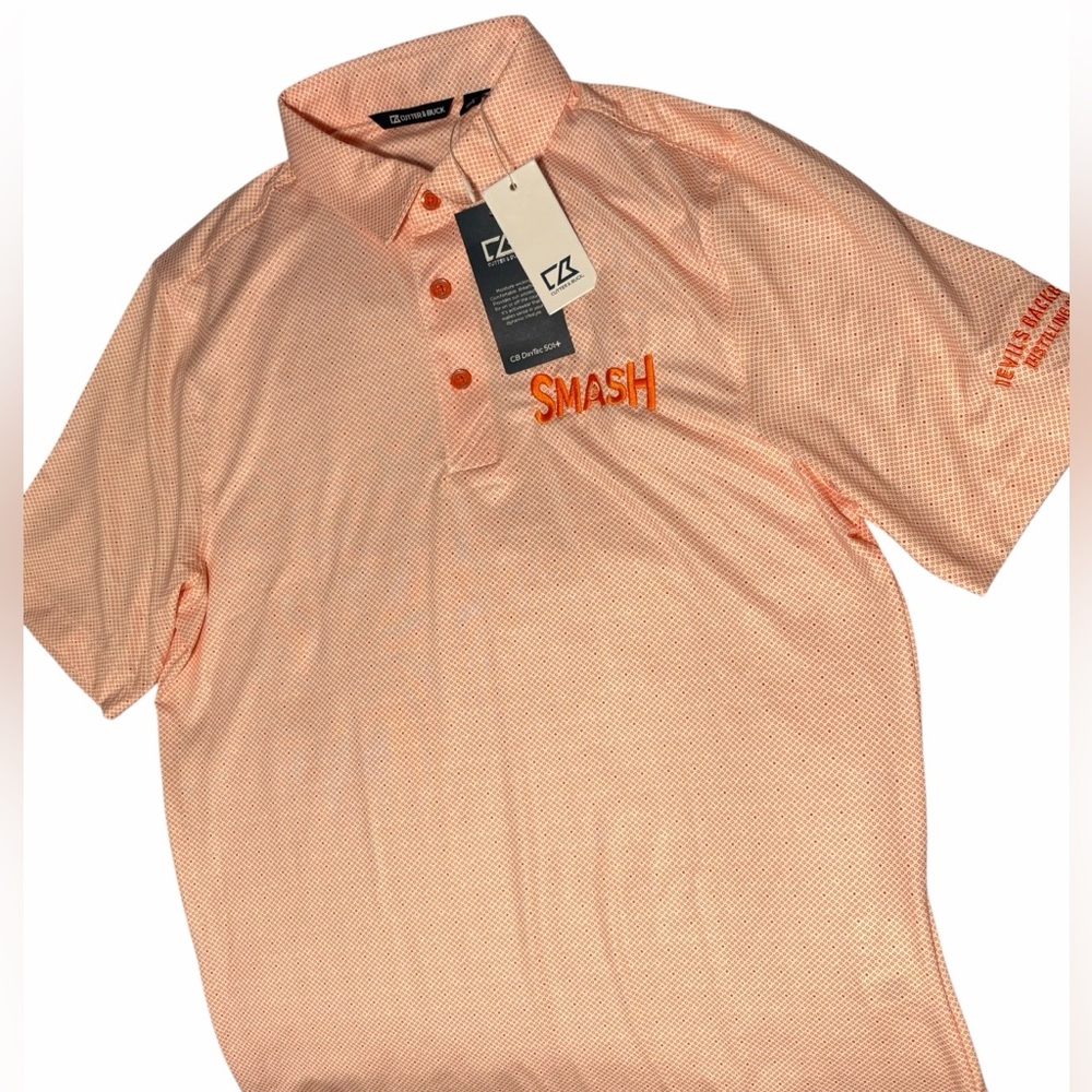 Cutter & Buck pale orange and white sports polo. Size S. NWT